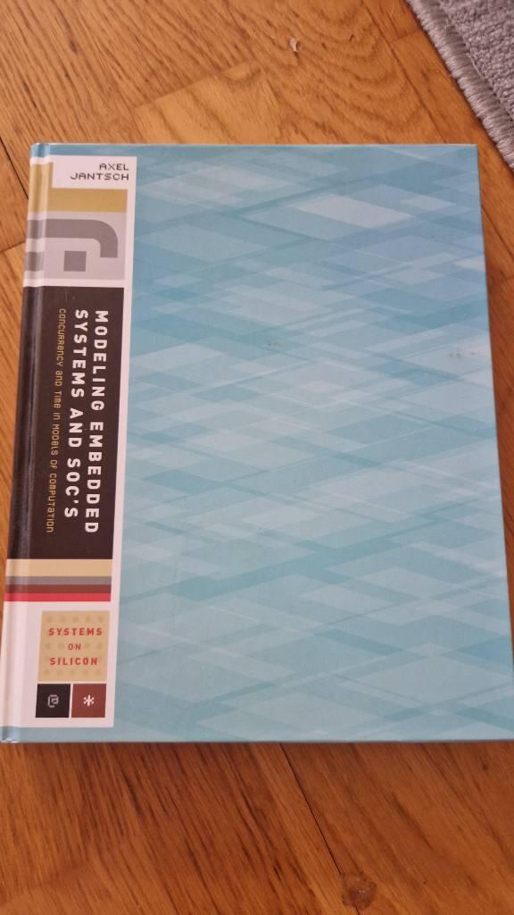 Modeling embedded systems and SoCs - concurrency and time in models of computation