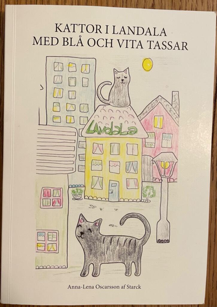 Kattor i Landala med bl&aring; och vita tassar