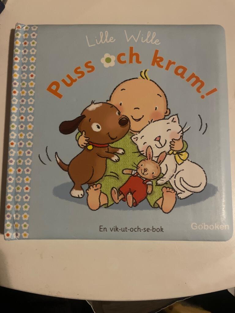 Puss och kram! : en vik-ut-och-se-bok