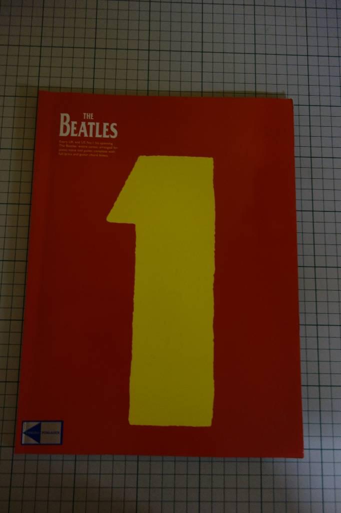 1 - [every UK and US no. 1 hit spanning the Beatles' entire career : arranged for piano, voice and guitar, complete with full lyrics and guitar chord boxes]