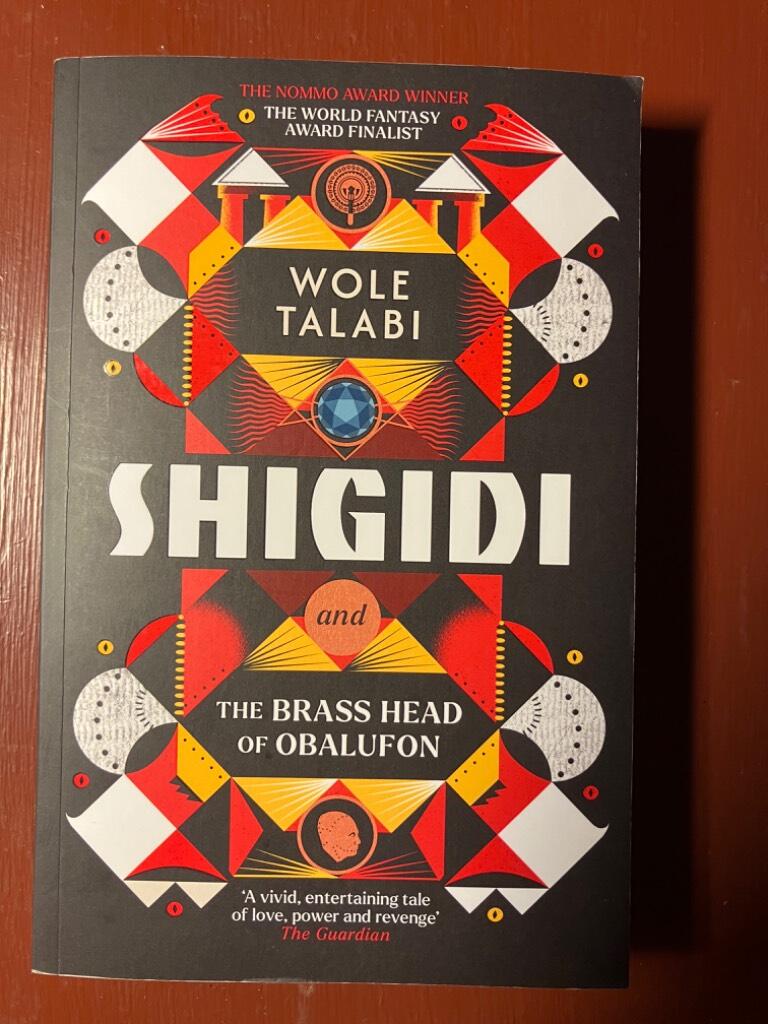 Shigidi and the brass head of Obalufon