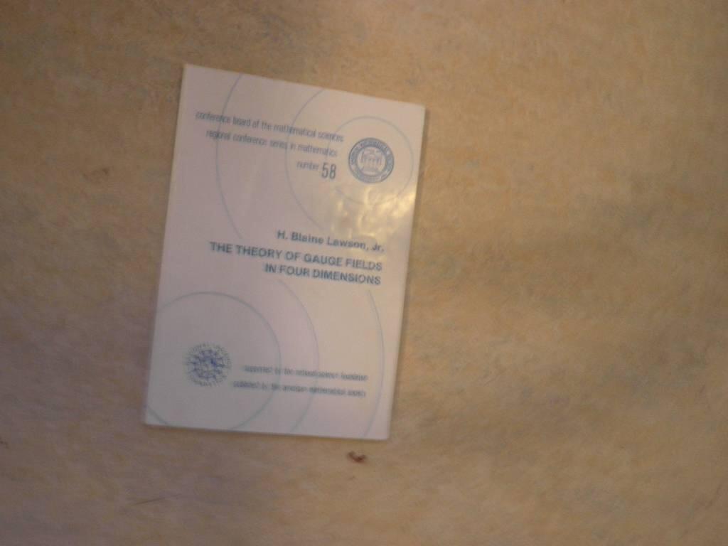 The theory of gauge fields in four dimensions - [expository lectures from the CBMS Regional Conference held at the University of California, Santa Barbara, August 1-5, 1983]