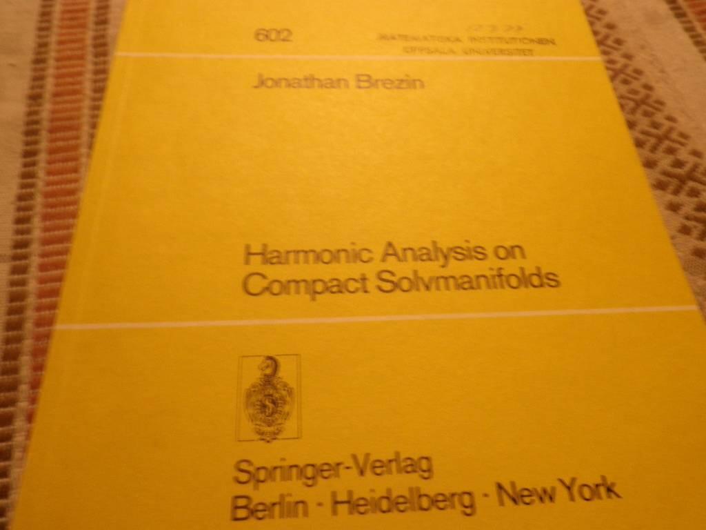 Harmonic analysis on compact solvmanifolds