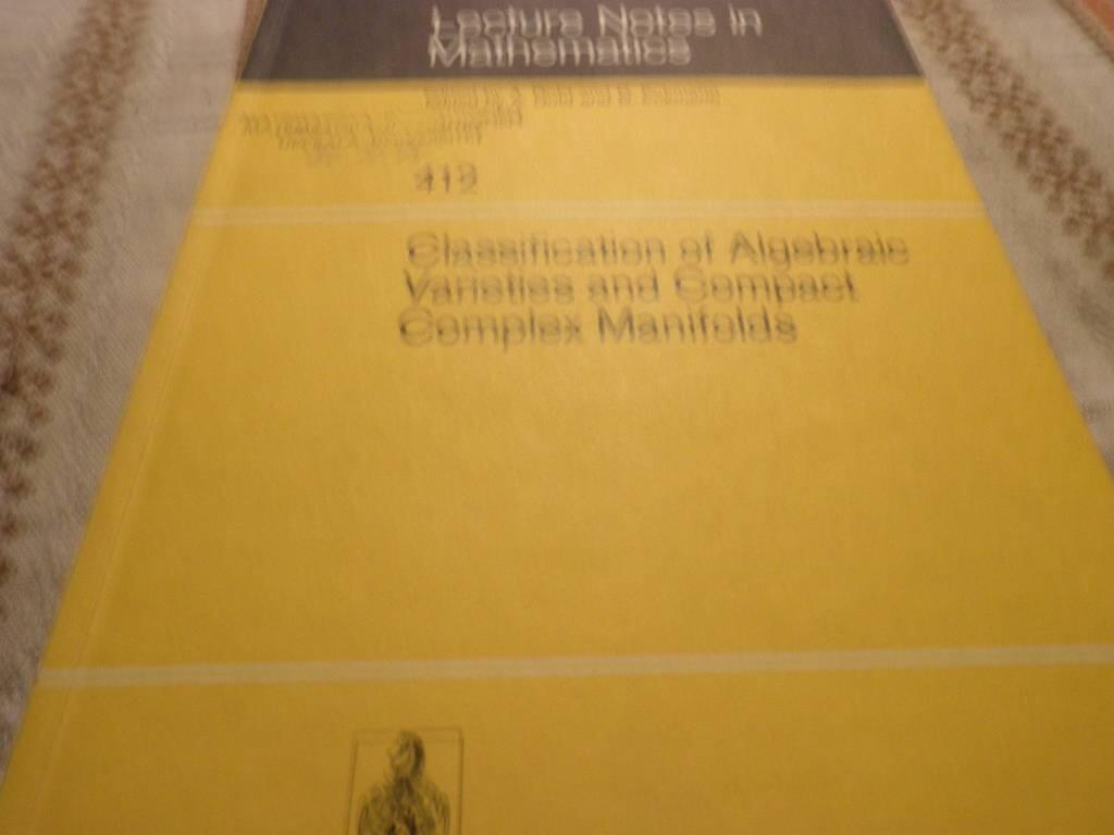 Classification of algebraic varieties and compact complex manifolds