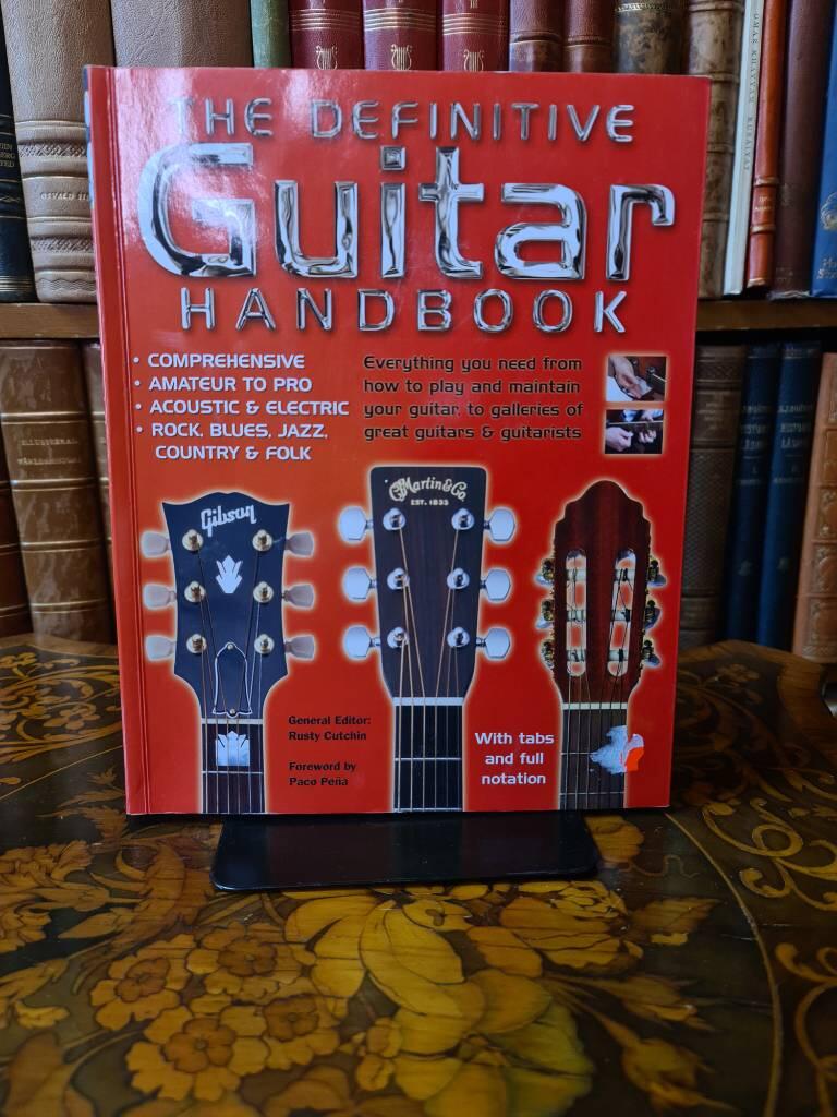 The definitive guitar handbook - [everything you need from how to play and maintain your guitar, to galleries of great guitars & guitarists]