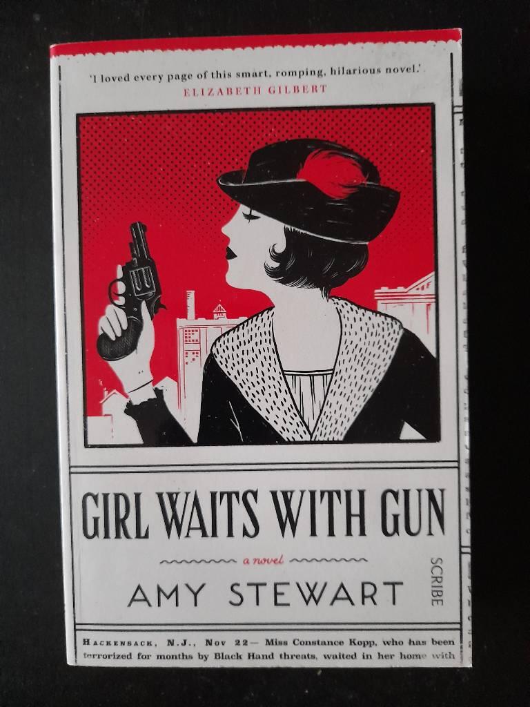 Girl waits with gun