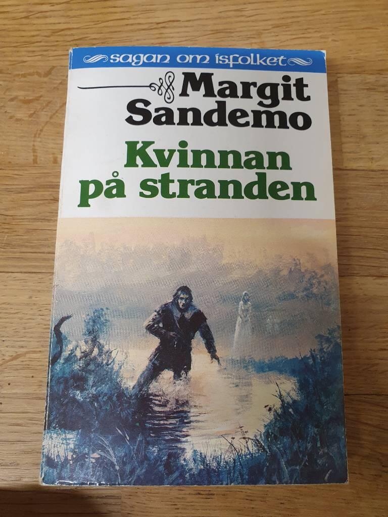 Kvinnan p&aring; stranden