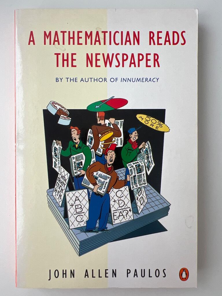 A mathematician reads the newspaper