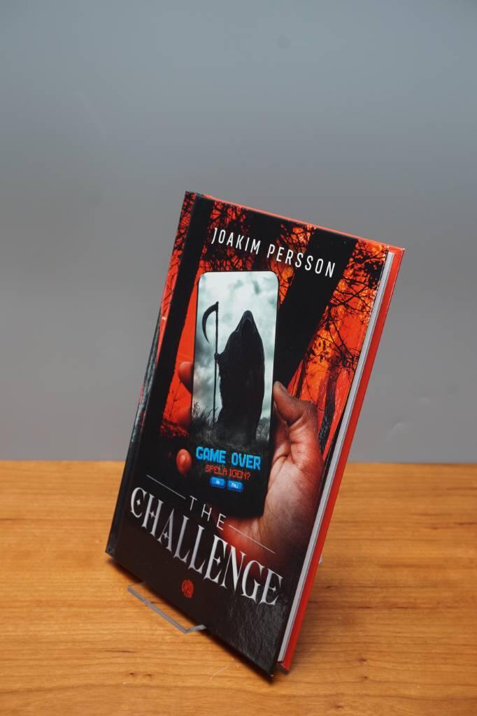 The Challenge : Noveller mellan spel och verklighet