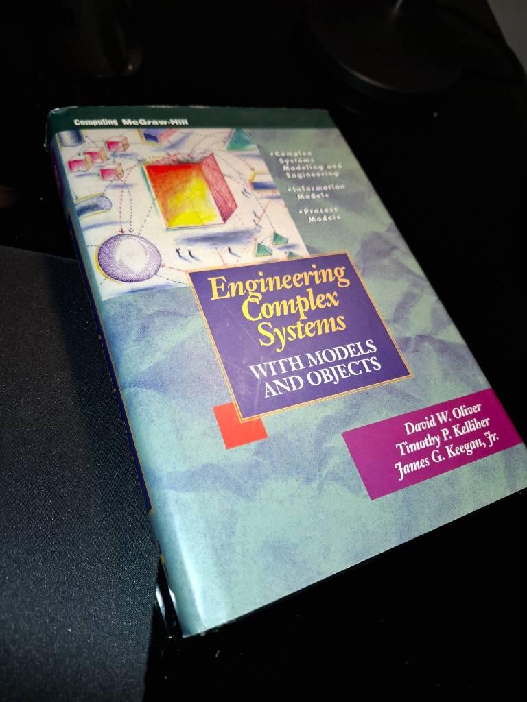 Engineering complex systems with models and objects