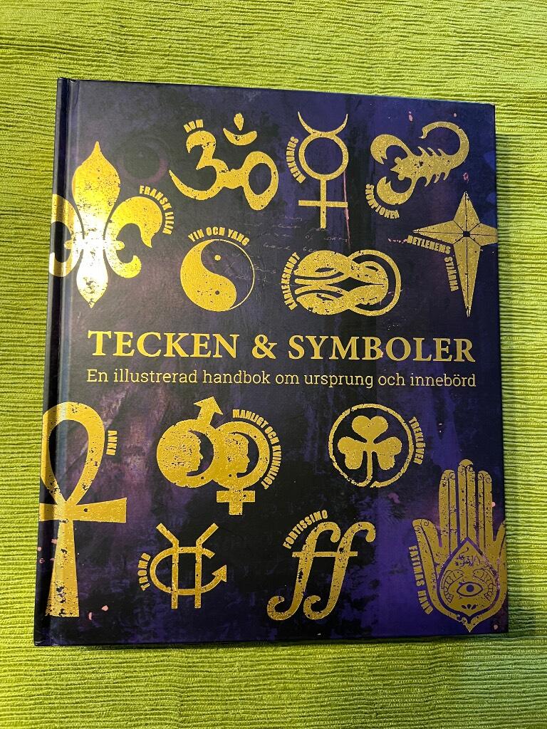 Tecken & symboler - en illustrerad handbok om ursprung och inneb&ouml;rd