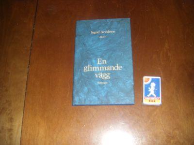 En glimmande v&auml;gg : dikter