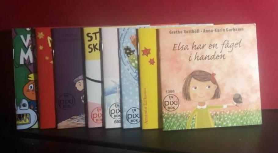 Elsa har en f&aring;gel i handen