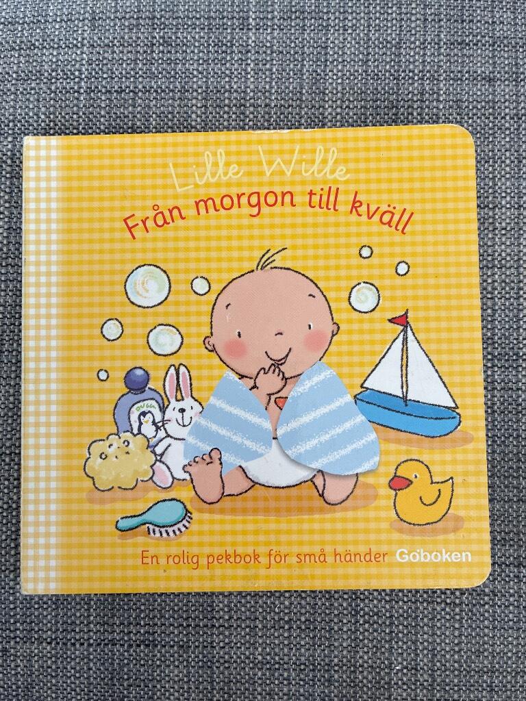 Fr&aring;n morgon till kv&auml;ll : en rolig pekbok f&ouml;r sm&aring; h&auml;nder