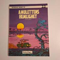 Gaston album 22 - Amulettens hemlighet