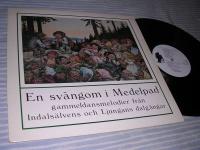 En sv&auml;ngom i Medelpad (LP) NM/EX trollomslag