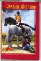 Jessica sitter upp