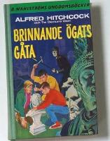 Alfred Hitchcock och Tre deckare l&ouml;ser Brinnande &ouml;gats g&aring;ta