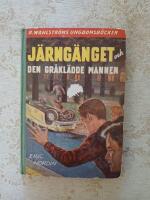 J&auml;rng&auml;nget och den gr&aring;kl&auml;dde mannen (983)