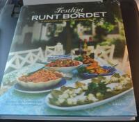 Festligt runt bordet : 14 h&auml;rliga menyer och buff&eacute;er f&ouml;r alla tillf&auml;llen hela &aring;ret