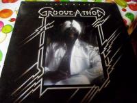 GROOVE. A-THON med store poster