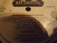 BLACK PAINT WHITE COLOUR