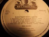 BLACK PAINT WHITE COLOUR