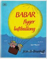 Babar flyger luftballong