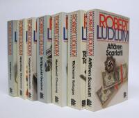 7 st. ROBERT LUDLUM pocketb&ouml;cker: Aff&auml;ren Scarlatti + T&auml;cknamn Tortugas + Nyckelord Chasong + Tr&auml;ffpunkt Gen&egrave;ve + V&auml;gen till Gandolfo + Uppdrag Matarese + Identitet Kain