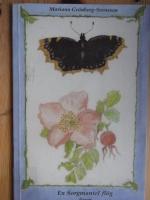 En sorgmantel fl&ouml;g &ouml;ver Linn&eacute;tr&auml;dg&aring;rden