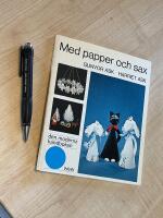 Med papper och sax