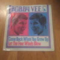 Come back when you grow up / Let the four winds blow