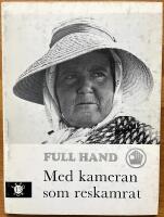 Full hand. Med kameran som reskamrat