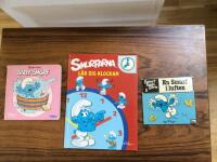 Bada med Babysmurf/ SMURFARNA L&Auml;R SIG KLOCKAN/ En Smurf i luften