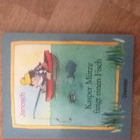 Kasper M&uuml;tze f&auml;ngt einen Fisch