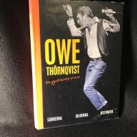 Owe Th&ouml;rnqvist : en gycklares visor : s&aring;ngerna, bilderna, historien
