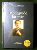 Modeguide f&ouml;r m&auml;n. NY inplastad bok.