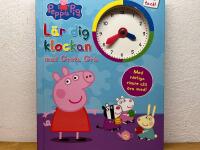 L&auml;r dig klockan med Greta Gris