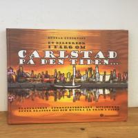 Carlstad p&aring; den tiden, en bilderbok i f&auml;rg. Planeringen, &aring;teruppbygnaden, milj&ouml;erna efter branden 1865 och hundra &aring;r fram i tiden