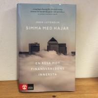 Simma med hajar : en resa mot finansv&auml;rldens innersta