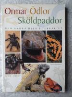 Ormar, &ouml;dlor, sk&ouml;ldpaddor och andra djur i terrariet