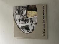 100 &aring;r p&aring; banen med Axel Ketner A/S