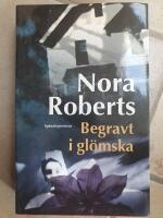 Begravt i gl&ouml;mska : sp&auml;nningsroman