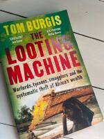 The looting machine - warlords, tycoons, smugglers and the systematic theft of Africa's wealth