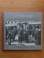 Ljus p&aring; glas : stunder i Stockholms stad med Axel och Vicke Malmstr&ouml;m