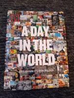 A day in the world : ett dygn i tusen bilder
