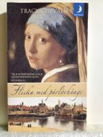 Flicka med p&auml;rl&ouml;rh&auml;nge