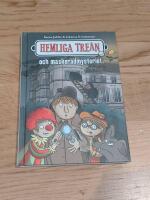Hemliga trean och maskeradmysteriet