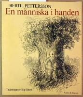 En m&auml;nniska i handen