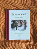 En svart hund